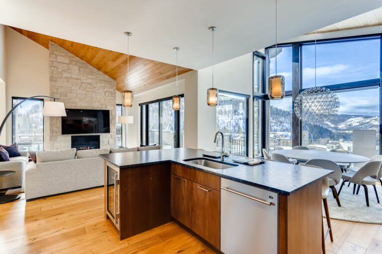 kitchen and living room view in vacation rental at the lion with a mountain view